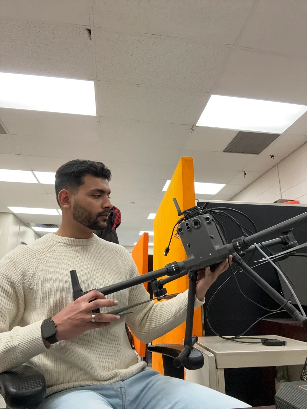 Adeel working with his research drone