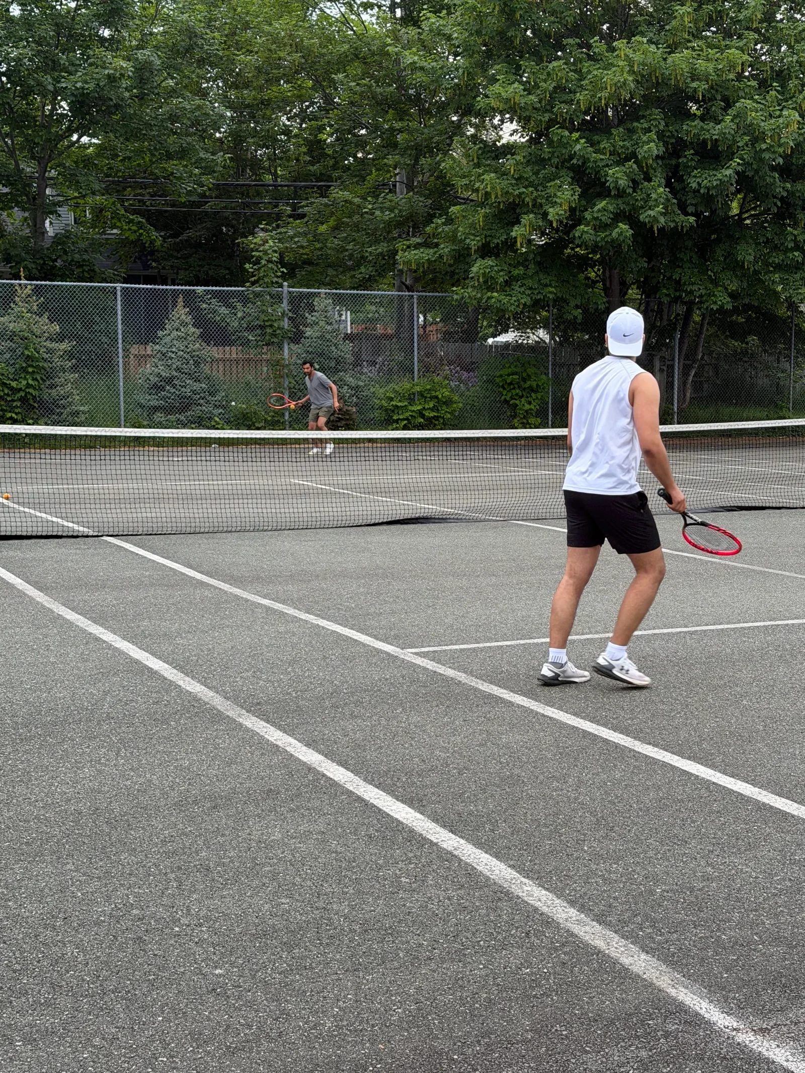 Adeel on a tennis court